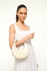 MINI MOON BAG CREAM - STAUD near me